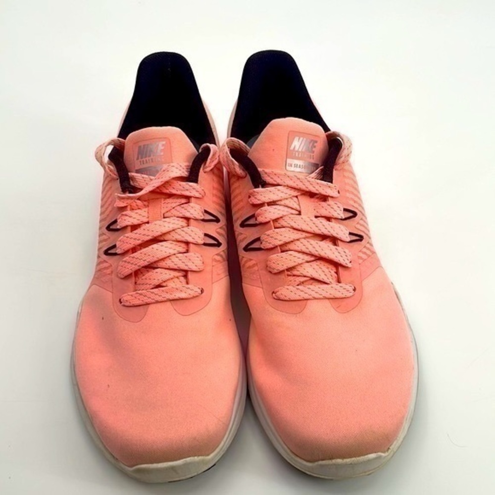 UEC Nike pink TR8 cross training sneakers. No box size 7.5 worn 3 times